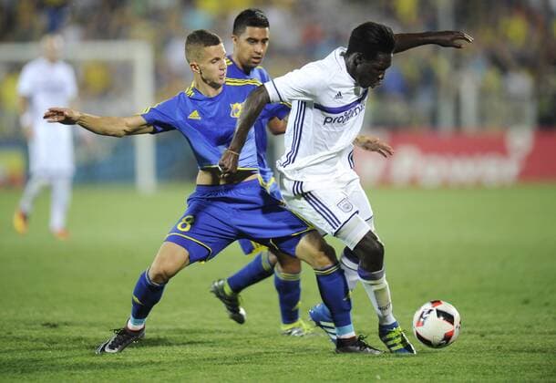 ROSTOV-ON-DON, RUSSIA - JULY 26, 2016: Rostov s Igor Kireyev and Anderlecht s Fabrice N Sakala (L-R front) fight for the ball in Leg 1 of their 2016 17 UEFA Champions League Third qualifying round match at Olimp-2 Stadium. The game ended in a 2:2 draw. Valery Matytsin TASS  TS02AF45