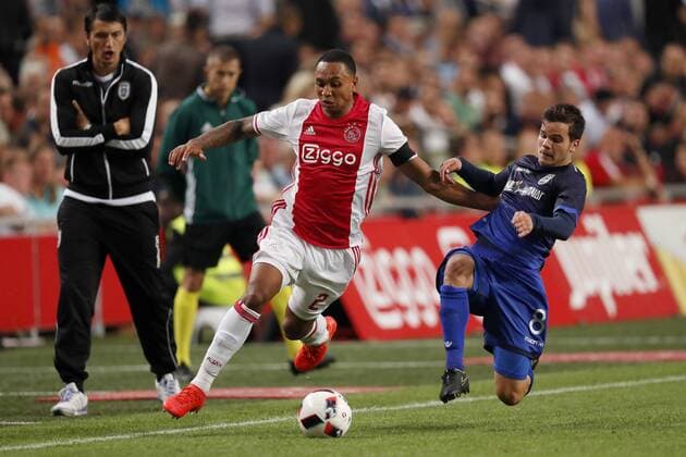 (L-R) Kenny Tete of Ajax, Charis Charisis of PAOK FC during the UEFA Champions League Third qualifying round first leg match between Ajax Amsterdam and PAOK Saloniki on July 26, 2016 at the Amsterdam Arena in Amsterdam, The Netherlands. Ajax v PAOK Saloniki UEFA Champions League 2016 2017 xVIxxIVx 5899075