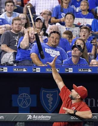 July 26, 2016 - Kansas City, MO, USA - A lost bat by the Los Angeles Angels Carlos Perez bounces off the net above the Angels dugout in the sixth inning against the Kansas City Royals on Tuesday, July 26, 2016, at Kauffman Stadium in Kansas City, Mo. LA Angels at Kansas City - ZUMAm67_