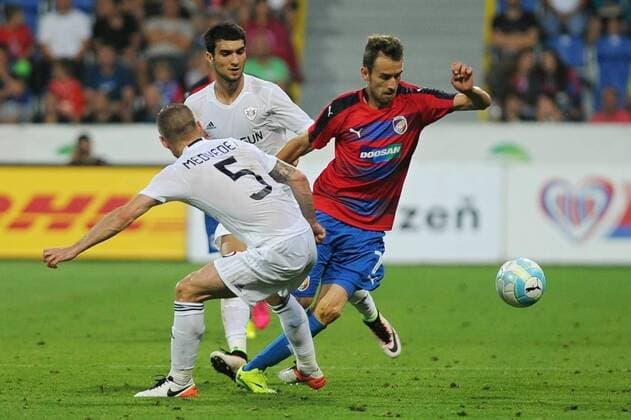 From left MAXIM MEDVEDEV and DANILO DIAS of Karabach and TOMAS HORAVA of Viktoria Plzen in action during the 3rd qualifying round of football Champions League, 1st leg: FC Viktoria Pilsen vs FK Karabach in Pilsen, Czech Republic, July 26, 2016. (CTKxPhoto PavelxNemecek) CTKPhotoP201607261006801  nmc5
