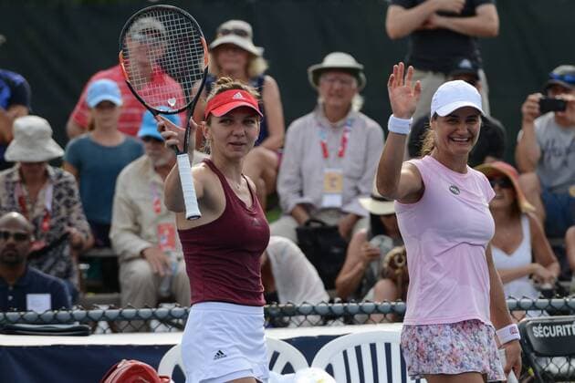 July 27, 2016 - Montreal, Canada - MONICA NICULESCU and SIMONA HALEP of Romania celebrate after winning their doubles match vs. Bondarenko Savchuk in the Rogers Cup Tennis Tournament. Tennis 2016 - Rogers Cup - Day 3 - ZUMAl132