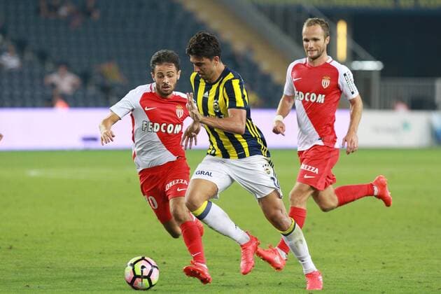 UEFA Champions League Third qualifying round first leg match between Fenerbahce Istanbul and Monaco on July 27, 2016 at the Ulker Stadium in Istanbul,Turkey. Final Score : Fenerbahce 2 - Monaco 1 Pictured: Ozan Tufan of Fenerbahce and Bernardo Silva (L) , Valere Germain of Monaco. 