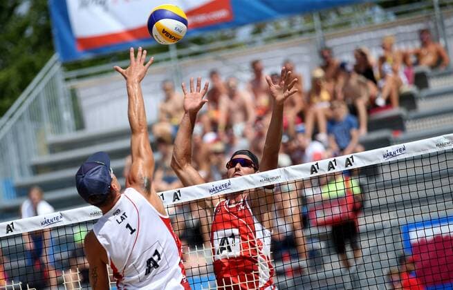 BEACHVOLLEYBALL - A1 Major Klagenfurt 2016 KLAGENFURT,AUSTRIA,28.JUL.16 - Beach volleyball Beachvolleyball - FIVB World Tour 2016, A1 Major Klagenfurt, men. Image shows Martins Plavins (LAT) and Martin Ermacora (AUT). GEPAxpictures xDanielxGoetzhaber