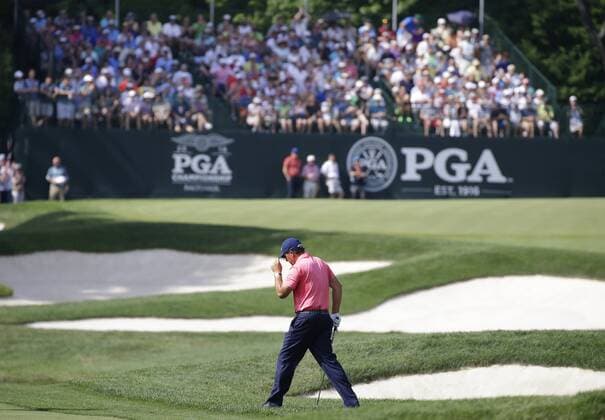 Phil Mickelson reacts at fans applause after hitting his approach shot on the 15th green in the first round at the PGA Golf Herren Championship at Baltusrol Golf Club in Springfield, New Jersey on July 28, 2016.  PGA20160728111 JOHNxANGELILLO