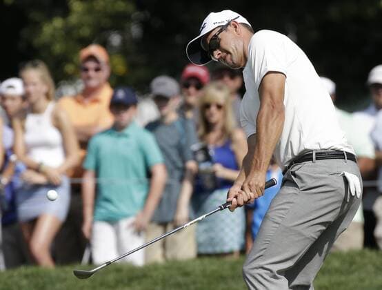 Adam Scott of Australia chips on to the 14th green in the first round at the PGA Golf Herren Championship at Baltusrol Golf Club in Springfield, New Jersey on July 28, 2016.  PGA20160728116 JOHNxANGELILLO