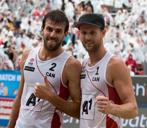 28.07.2016, Strandbad, Klagenfurt, AUT, FIVB World Tour, Beachvolleyball Major Series, Klagenfurt, Herren, im Bild Chaim Schalk (1, CAN), Ben Saxton (2, CAN) during the FIVB World Tour Major Series Tournament at the Strandbad in Klagenfurt, Austria on 2016 07 28. Klagenfurt EP_ste