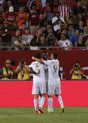 July 27, 2016 - Chicao, Illinois, U.S - Teammates congratulate AC Milan Forward NIANG MBAYE (11) scores a goal in the first half of the game at Soldier Field. SOCCER 2016: Penalties were needed to break a 3-3 draw between Bayern Munich and AC Milan Wednesday July 27, 2016 at Soldier Field in Chicago, Illinois. AC Milan won the shootout 5-3. - ZUMAl136