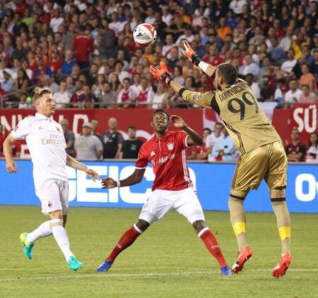 July 27, 2016 - Chicao, Illinois, U.S - Bayern Munich Defender DAVID ALABA (27) & AC Milan Goalkeeper DONNARUMMA GIANLUIGI (99) going for the ball during the first half of the game at Soldier Field. SOCCER 2016: Penalties were needed to break a 3-3 draw between Bayern Munich and AC Milan Wednesday July 27, 2016 at Soldier Field in Chicago, Illinois. AC Milan won the shootout 5-3. - ZUMAl136