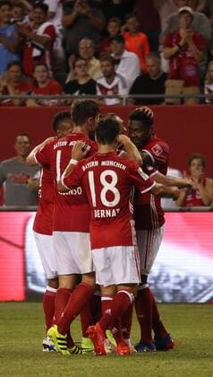 July 27, 2016 - Chicao, Illinois, U.S - Teammates congratulate Bayern Munich Defender DAVID ALABA (27) after scoring a goal in the first half of the game at Soldier Field. SOCCER 2016: Penalties were needed to break a 3-3 draw between Bayern Munich and AC Milan Wednesday July 27, 2016 at Soldier Field in Chicago, Illinois. AC Milan won the shootout 5-3. - ZUMAl136