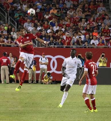 July 27, 2016 - Chicao, Illinois, U.S - AC Milan Forward NIANG MBAYE (11) & Bayern Munich Midfielder XAVI ALONSO (14) in action during the first half of the game at Soldier Field. SOCCER 2016: Penalties were needed to break a 3-3 draw between Bayern Munich and AC Milan Wednesday July 27, 2016 at Soldier Field in Chicago, Illinois. AC Milan won the shootout 5-3. - ZUMAl136