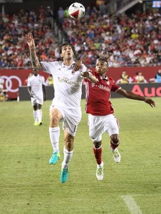 July 27, 2016 - Chicao, Illinois, U.S - AC Milan Defender ROMAGNOLI ALESSIO (13) & Bayern Munich Defender JULIAN GREEN (37) going for the ball during the first half of the game at Soldier Field. SOCCER 2016: Penalties were needed to break a 3-3 draw between FC Bayern Munich and AC Milan Wednesday July 27, 2016 at Soldier Field in Chicago, Illinois. AC Milan won the shootout 5-3. - ZUMAl136