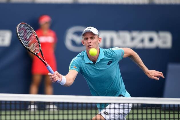 July 28, 2016: Kevin Anderson of South Africa returns the ball to Bernard Tomic of Australia during their third round match of the Rogers Cup tournament at the Aviva Centre in Toronto, Ontario, Canada on July 28, 2016. Cal Media TENNIS 2016 - Rogers Cup Toronto July 28 - ZUMAc04_