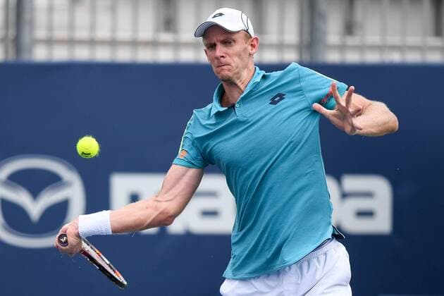 July 28, 2016: Kevin Anderson of South Africa returns the ball to Bernard Tomic of Australia during their third round match of the Rogers Cup tournament at the Aviva Centre in Toronto, Ontario, Canada on July 28, 2016. Cal Media TENNIS 2016 - Rogers Cup Toronto July 28 - ZUMAc04_