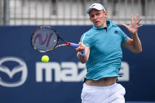 July 28, 2016: Kevin Anderson of South Africa returns the ball to Bernard Tomic of Australia during their third round match of the Rogers Cup tournament at the Aviva Centre in Toronto, Ontario, Canada on July 28, 2016. Cal Media TENNIS 2016 - Rogers Cup Toronto July 28 - ZUMAc04_