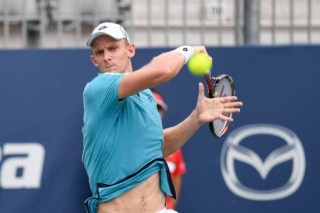 July 28, 2016: Kevin Anderson of South Africa returns the ball to Bernard Tomic of Australia during their third round match of the Rogers Cup tournament at the Aviva Centre in Toronto, Ontario, Canada on July 28, 2016. Cal Media TENNIS 2016 - Rogers Cup Toronto July 28 - ZUMAc04_