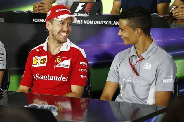 Motorsports: FIA Formula One World Championship WM Weltmeisterschaft 2016, Grand Prix of Germany, 5 Sebastian Vettel (GER, Scuderia Ferrari), 94 Pascal Wehrlein (GER, Manor Racing F1 Team), xHOCHxZWEIx