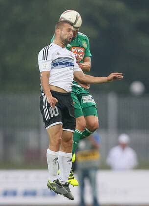 SOCCER - EL quali, Zhodino vs Rapid ZHODZINA,BELARUS,28.JUL.16 - SOCCER - UEFA Europa League, qualification, FC Torpedo Zhodino vs SK Rapid Wien. Image shows Andrei Khachaturyan (Schodsina) and Christopher Dibon (Rapid). Keywords: Wien Energie. GEPAxpictures xMarioxKneisl