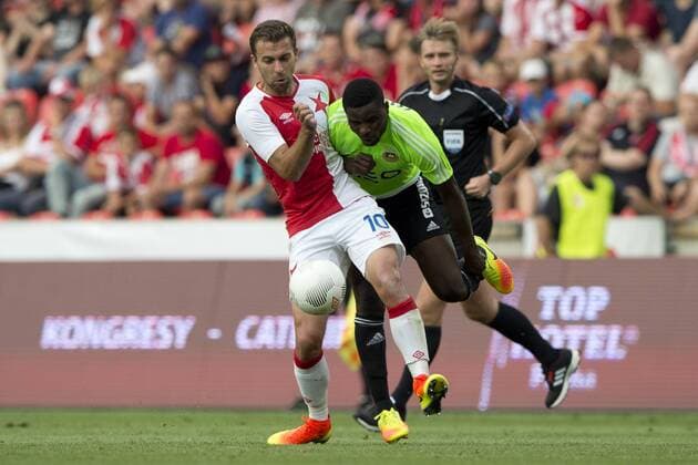 From left: Josef Husbauer from Slavia and Alhassan Wakaso from Rio in action during the Football Europa League 3rd qualifying round match SK Slavia Praha vs Rio Ave, in Prague, Czech Republic, July 28, 2016. (CTKxPhoto MichalxKamaryt) CTKPhotoP201607280934701  kmt 5