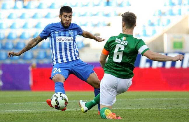 Genk s Alejandro Pozuelo and Cork s Greg Bolger fight for the ball during the first leg game of the third qualifying round between Belgian first league soccer team KRC Genk and Ireland s Cork City F.C. in the Europa League competition, on Thursday 28 July 2016, in Genk. VIRGINIExLEFOUR  x04899727x