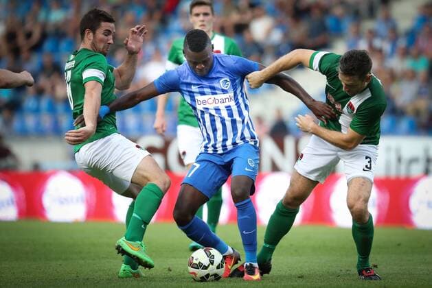Cork s Gearooid Morrissey, Genk s Mwbana Ally Samatta and Cork s Alan Bennett fight for the ball during the first leg game of the third qualifying round between Belgian first league soccer team KRC Genk and Ireland s Cork City F.C. in the Europa League competition, on Thursday 28 July 2016, in Genk. VIRGINIExLEFOUR  x04899760x