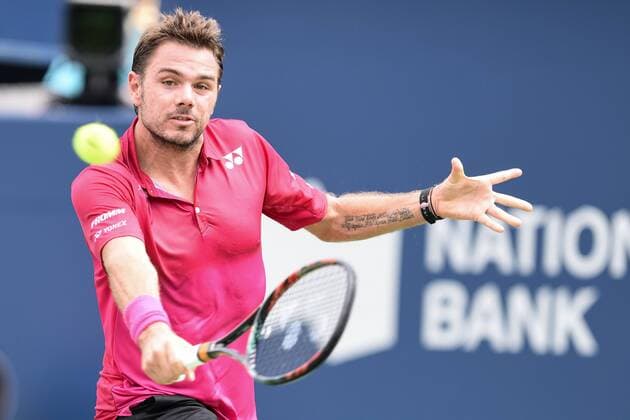 Bilder des Tages - Sport July 28, 2016: Stan Wawrinka of Switzerland returns the ball to Jack Sock of the United States during their third round match of the Rogers Cup tournament at the Aviva Centre in Toronto, Ontario, Canada on July 28, 2016. Cal Media TENNIS 2016 - Rogers Cup Toronto July 28 - ZUMAc04_