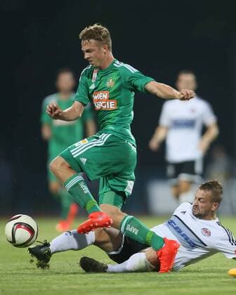 SOCCER - EL quali, Zhodino vs Rapid ZHODZINA,BELARUS,28.JUL.16 - SOCCER - UEFA Europa League, qualification, FC Torpedo Zhodino vs SK Rapid Wien. Image shows Philipp Schobesberger (Rapid) and Andrei Khachaturyan (Schodsina). Keywords: Wien Energie. GEPAxpictures xMarioxKneisl