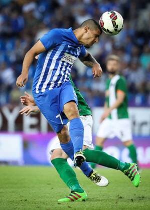 Genk s Nikolaos Karelis fights for the ball during the first leg game of the third qualifying round between Belgian first league soccer team KRC Genk and Ireland s Cork City F.C. in the Europa League competition, on Thursday 28 July 2016, in Genk. VIRGINIExLEFOUR  x04899879x