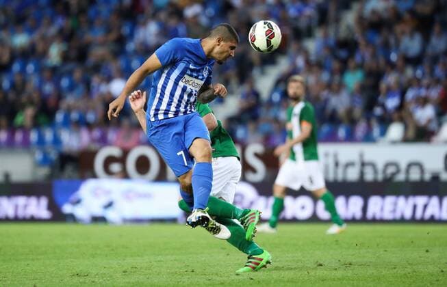 Genk s Nikolaos Karelis fights for the ball during the first leg game of the third qualifying round between Belgian first league soccer team KRC Genk and Ireland s Cork City F.C. in the Europa League competition, on Thursday 28 July 2016, in Genk. VIRGINIExLEFOUR  x04899880x