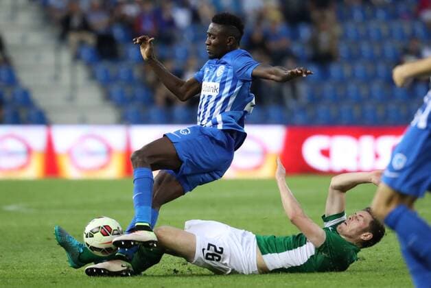 Genk s Wilfried Ndidi and Cork s Garry Buckley fight for the ball during the first leg game of the third qualifying round between Belgian first league soccer team KRC Genk and Ireland s Cork City F.C. in the Europa League competition, on Thursday 28 July 2016, in Genk. VIRGINIExLEFOUR  x04899891x
