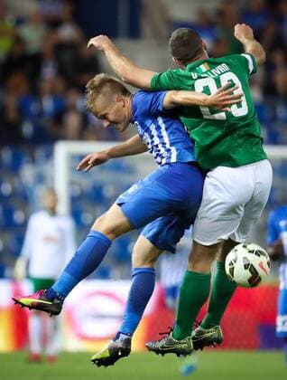 Genk s Jere Uronen and Cork s Mark O Sullivan fight for the ball during the first leg game of the third qualifying round between Belgian first league soccer team KRC Genk and Ireland s Cork City F.C. in the Europa League competition, on Thursday 28 July 2016, in Genk. VIRGINIExLEFOUR  x04899939x