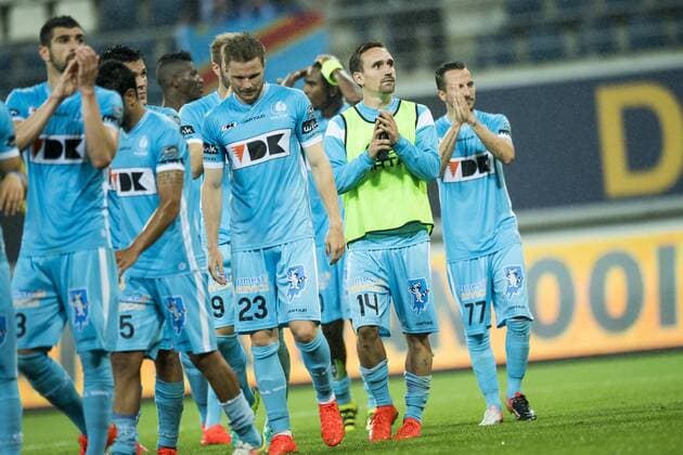 Gent s Lasse Nielsen, Gent s Sven Kums and Gent s Danijel Milicevic celebrate after winning the first leg match of the third qualifying round between Belgian first league soccer team KAA Gent and Romania s FC Viitorul Constanta in the Europa League competition, on Thursday 28 July 2016, in Gent. JASPERxJACOBS  x04900033x