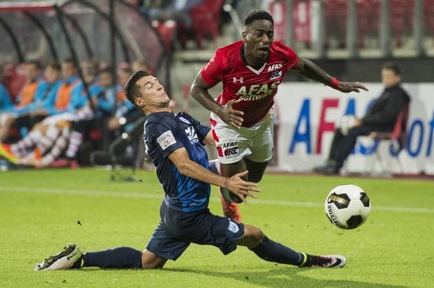 (L-R) Nikos Karanikas of PAS Giannina, Ridgeciano Haps of AZ Alkmaar during the UEFA Europa League third round first leg qualifying match between AZ Alkmaar and Giannina on July 28, 2016 at the AFAS stadium in Alkmaar, The Netherlands. AZ Alkmaar v Giannina UEFA Europa League third round 2016 2017 xVIxGerritxvanxKeulenxIVx 5906597