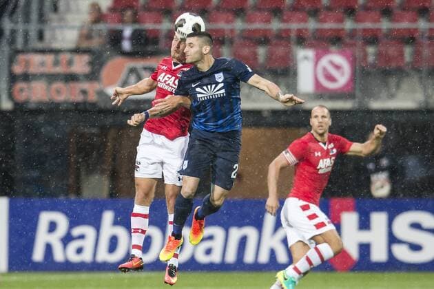 (L-R) Mattias Johansson of AZ Alkmaar, Chrysovalantis Korozonis of PAS Giannina, Ron Vlaar of AZ Alkmaar during the UEFA Europa League third round first leg qualifying match between AZ Alkmaar and Giannina on July 28, 2016 at the AFAS stadium in Alkmaar, The Netherlands. AZ Alkmaar v Giannina UEFA Europa League third round 2016 2017 xVIxGerritxvanxKeulenxIVx 5906683