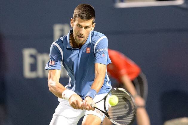 July 28, 2016: Novak Djokovic of Serbia & Montenegro returns the ball to Radek Stepanek of Czech Republic during their third round match of the Rogers Cup tournament at the Aviva Centre in Toronto, Ontario, Canada on July 28, 2016. Cal Media TENNIS 2016 - Rogers Cup Toronto July 28 - ZUMAc04_