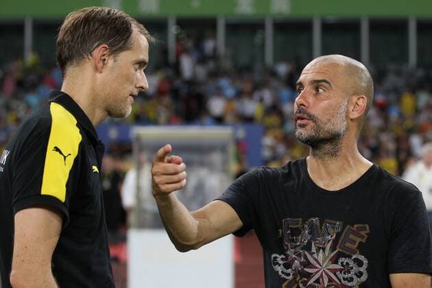 Head coach Pep Guardiola of Manchester City, right, talks to head coach Thomas Tuchel of Borussia Dortmund before the penalty shootout of the Shenzhen match of the 2016 International Champions Cup China in Shenzhen city, south China s Guangdong province, 28 July 2016. Pep Guardiola got his first taste of victory as Manchester City s manager Thursday (28 July 2016) night after beating Borussia Dortmund on penalties in a friendly, but expressed concern about the looming English Premier League season. Football today is tough, said Guardiola, whose side beat their German opposition in the southern Chinese city of Shenzhen. City won, and finally got the workout Guardiola had craved, thanks to a 6-5 penalty shootout win over Dortmund, after the game ended one apiece. City keeper Angus Gunn was the hero of penalties with three saves, including the one sealing their victory when he palmed away Mikel Merino s attempt. Manchester City beat Dortmund on penalties in Shenzhen  20160728_65262