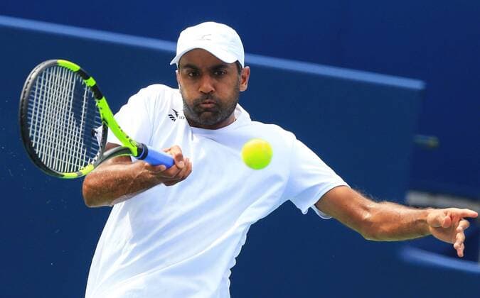 (160729) -- TORONTO, July 29, 2016 -- Rajeev Ram of the United States returns the ball against Kei Nishikori of Japan during their third round of men s singles match at the 2016 Rogers Cup in Toronto, Canada, July 28, 2016. Rajeev Ram lost 0-2. )(hcs) (SP)CANADA-TORONTO-TENNIS-ROGERS CUP-MEN S SINGLES ZouxZheng 