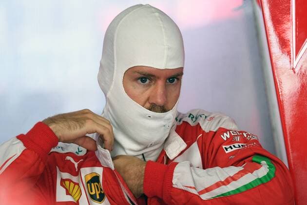 Sebastian VETTEL,GER (Scuderia Ferrari) in der Box mit Feuerhaube, Aktion,Einzelbild, angeschnittenes Einzelmotiv,Portraet,Portrait,Porträt. 1.Training,Formel 1:GP von Deutschland,Hockenheimring,Saison2016,am 28.07.2016.