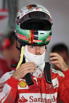 Sebastian VETTEL,GER (Scuderia Ferrari) in der Box setzt seine Helm auf, Aktion,Einzelbild, angeschnittenes Einzelmotiv,Portraet,Portrait,Porträt. 1.Training,Formel 1:GP von Deutschland,Hockenheimring,Saison2016,am 28.07.2016.