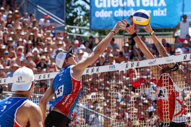 BEACHVOLLEYBALL - A1 Major Klagenfurt 2016 KLAGENFURT,AUSTRIA,29.JUL.16 - Beach volleyball Beachvolleyball - FIVB World Tour 2016, A1 Major Klagenfurt, men. Image shows Tri Bourne (USA) and Clemens Doppler (AUT). GEPAxpictures xMaticxKlansek