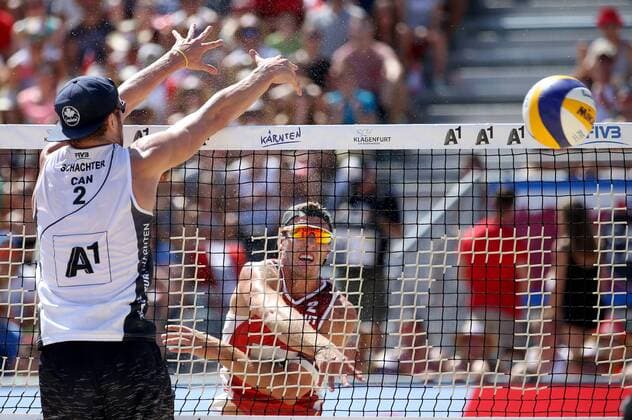 BEACHVOLLEYBALL - A1 Major Klagenfurt 2016 KLAGENFURT,AUSTRIA,29.JUL.16 - Beach volleyball Beachvolleyball - FIVB World Tour 2016, A1 Major Klagenfurt, men. Image shows Sam Schachter (CAN) and Moritz Bernd Pristauz-Telsnigg (AUT). GEPAxpictures xDanielxGoetzhaber