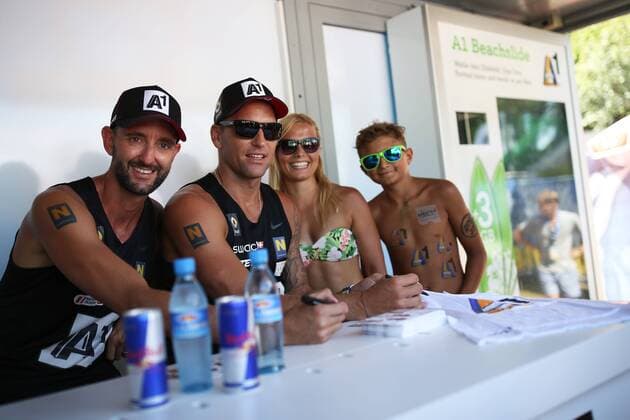 BEACHVOLLEYBALL - A1 Major Klagenfurt 2016 KLAGENFURT,AUSTRIA,29.JUL.16 - Beach volleyball Beachvolleyball - FIVB World Tour 2016, A1 Major Klagenfurt, men. Image shows Clemens Doppler, Alexander Horst (AUT) and fans. GEPAxpictures xDanielxGoetzhaber