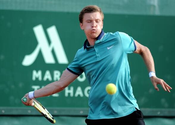 SCHEVENINGEN - Alexey Vatutin of Rissia in action against Alexey Robin Haase of The Netherlands in the quarterfinals men s singles of The Hague Open 2016. ATP Tennis Herren Challenger Tour at Berkenbosch, Scheveningen, The Netherlands, 29 juli 2016. The Hague Open 2016 xVIxxIVx 5908958