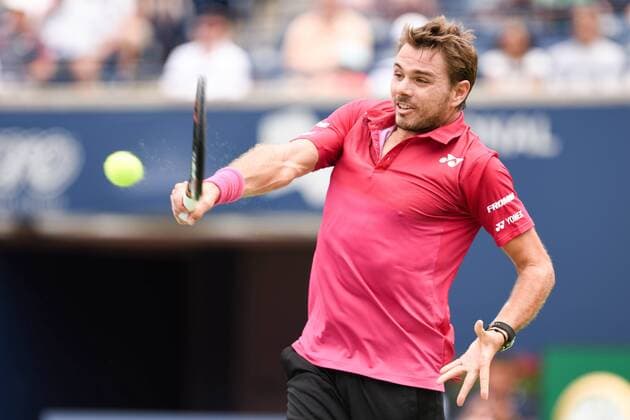 July 29, 2016: Stan Wawrinka of Switzerland returns the ball to Kevin Anderson of South Africa during their quarter finals match of the Rogers Cup tournament at the Aviva Centre in Toronto, Ontario, Canada on July 29, 2016. Cal Media TENNIS 2016 - Rogers Cup Toronto July 29 - ZUMAc04_