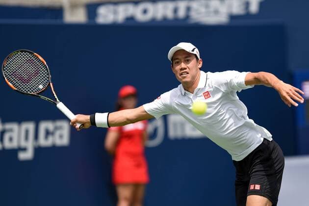 July 29, 2016: Kei Nishikori of Japan returns the ball to Grigor Dimitrov of Bulgaria during their quarter finals match of the Rogers Cup tournament at the Aviva Centre in Toronto, Ontario, Canada on July 29, 2016. Cal Media TENNIS 2016 - Rogers Cup Toronto July 29 - ZUMAc04_