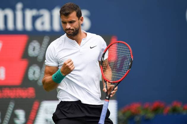July 29, 2016: Grigor Dimitrov of Bulgaria celebrates a point against Kei Nishikori of Japan during their quarter finals match of the Rogers Cup tournament at the Aviva Centre in Toronto, Ontario, Canada on July 29, 2016. Cal Media TENNIS 2016 - Rogers Cup Toronto July 29 - ZUMAc04_