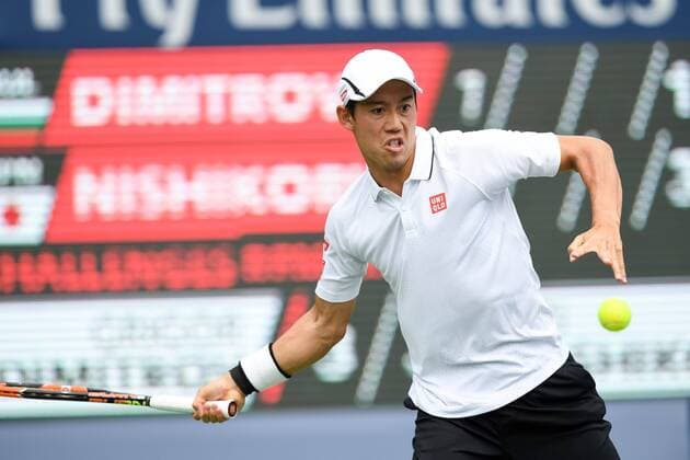 July 29, 2016: Kei Nishikori of Japan returns the ball to Grigor Dimitrov of Bulgaria during their quarter finals match of the Rogers Cup tournament at the Aviva Centre in Toronto, Ontario, Canada on July 29, 2016. Cal Media TENNIS 2016 - Rogers Cup Toronto July 29 - ZUMAc04_