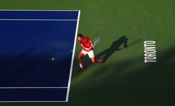 (160730) -- TORONTO, July 29, 2016 -- Tomas Berdych of the Czech Republic returns the ball against Novak Djokovic of Serbia during their quarterfinal match of men s singles at the 2016 Rogers Cup in Toronto, Canada, July 29, 2016. Tomas Berdych lost 0-2. )(hcs) (SP)CANADA-TORONTO-TENNIS-ROGERS CUP-MEN S SINGLES ZouxZheng 
