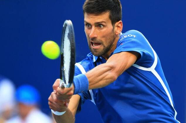 (160730) -- TORONTO, July 29, 2016 -- Novak Djokovic of Serbia returns the ball against Tomas Berdych of the Czech Republic during their quarterfinal match of men s singles at the 2016 Rogers Cup in Toronto, Canada, July 29, 2016. Novak Djokovic won 2-0. )(hcs) (SP)CANADA-TORONTO-TENNIS-ROGERS CUP-MEN S SINGLES ZouxZheng 