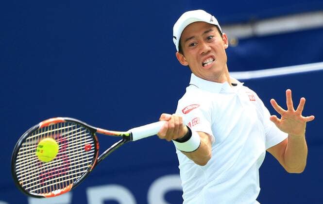 (160729) -- TORONTO, July 29, 2016 -- Kei Nishikori of Japan returns the ball against Grigor Dimitrov of Bulgaria during their quarterfinal match of men s singles at the 2016 Rogers Cup in Toronto, Canada, July 29, 2016. Kei Nishikori won 2-1. ) (xr) (SP)CANADA-TORONTO-TENNIS-ROGERS CUP-MEN S SINGLES ZouxZheng 