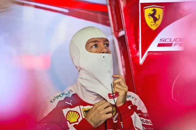 Sebastian Vettel (Scuderia Ferrari) in der Box mit feuerfester Haube und Blick zum Ferrari Pferd, Grosser Preis von Deutschland 2016, 3. freies Training, Motorsport, Formel 1, 30.07.2016, Copyright: Neisx Eibner-Pressefoto EP_ans